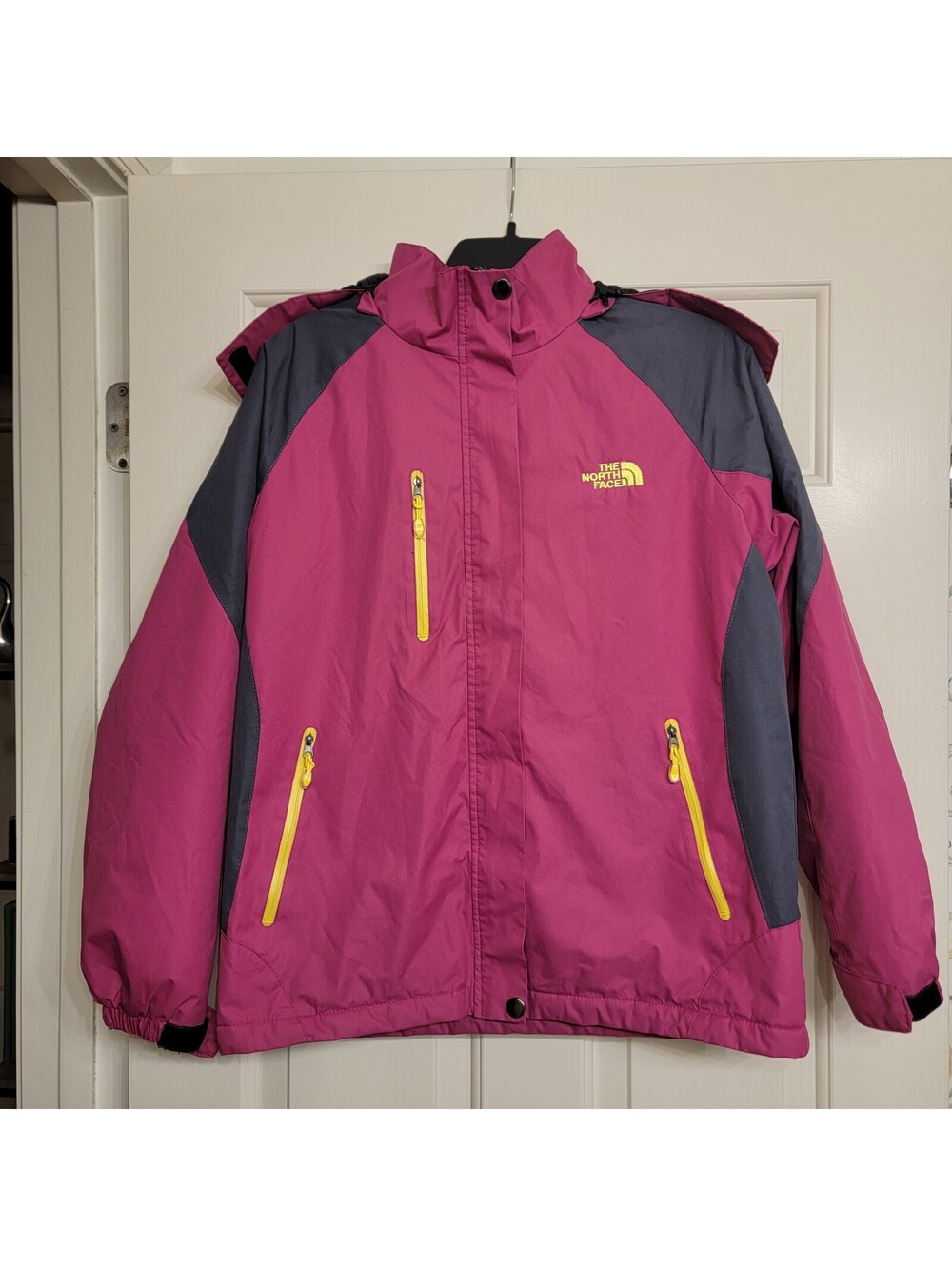 The North Face Pink and Gray Waterproof Jacket with Yellow Zippers and Logo